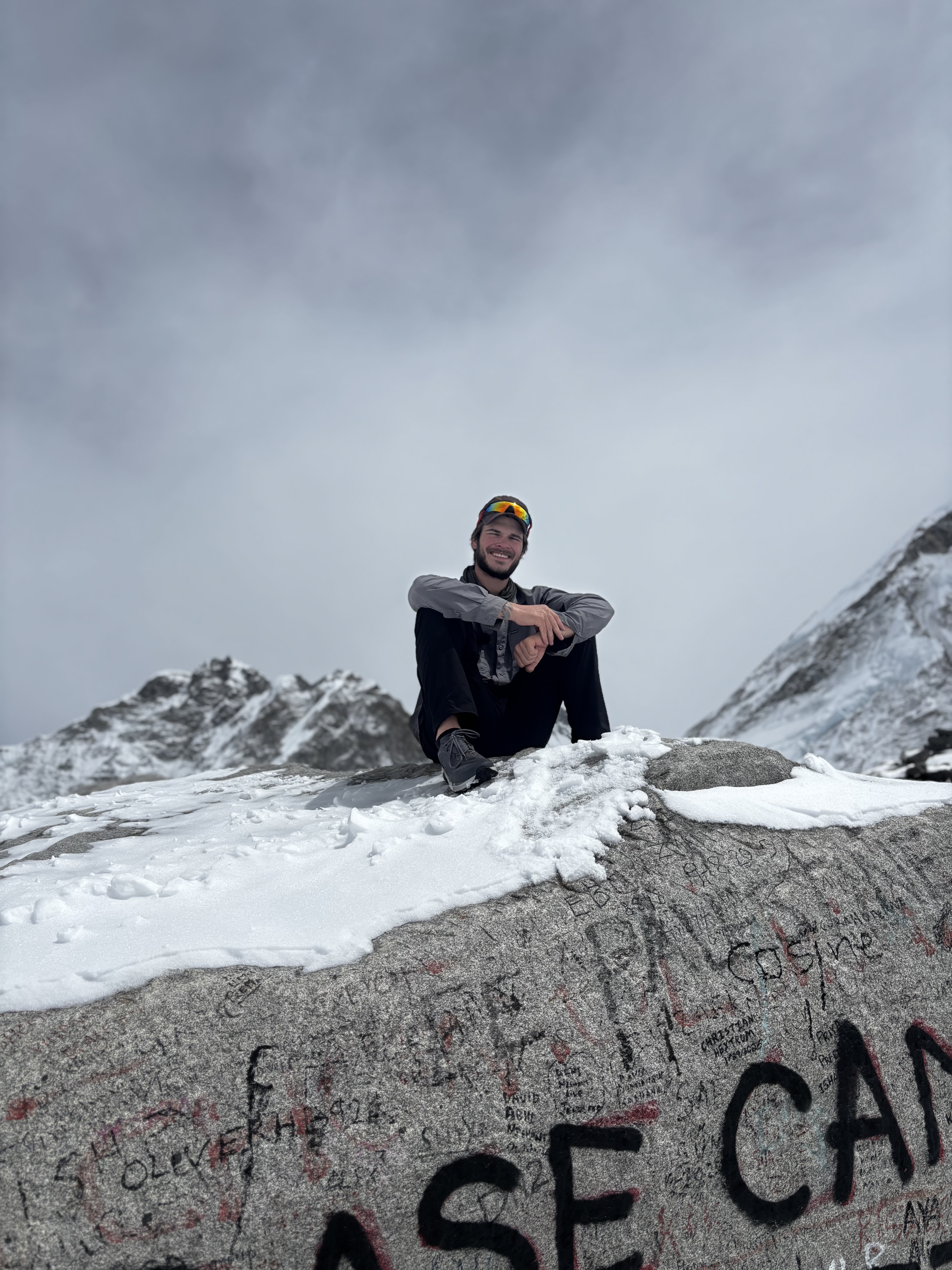 Simon Lusignan at the summit, the real trail experience behind the coaching
